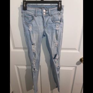 Rue21 size 6 distressed mid rise light wash jeans